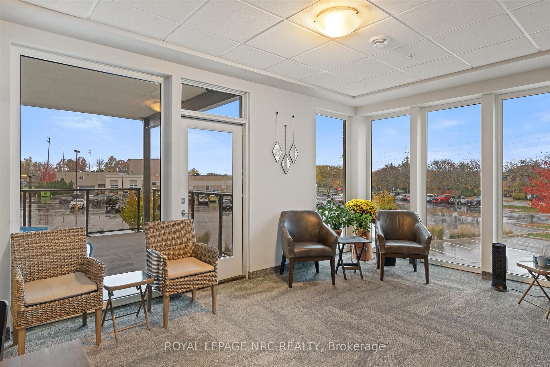 Sunroom with balcony at end of hall