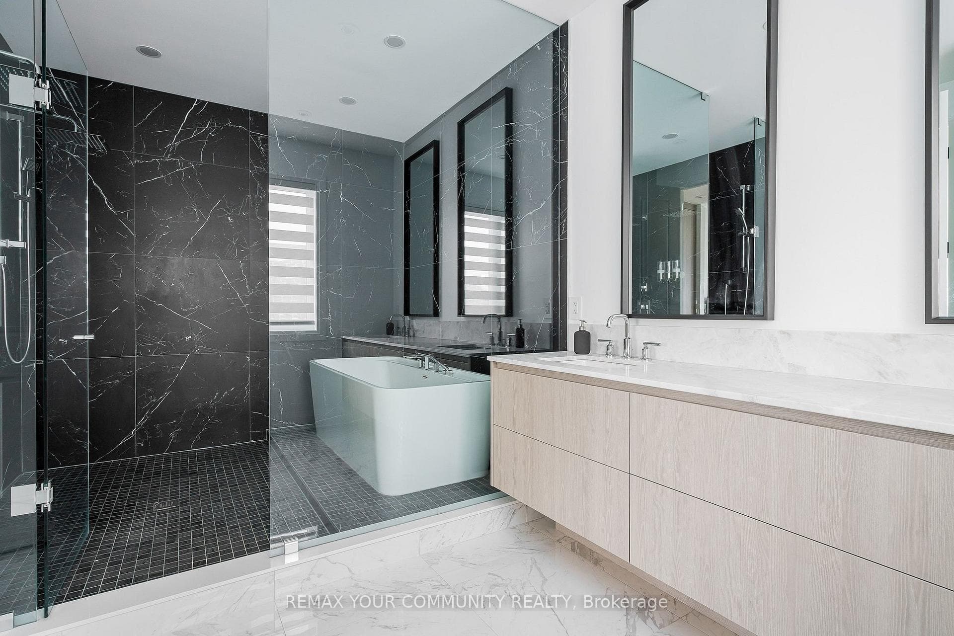 Heated floors, freestanding tub & dual shower zone