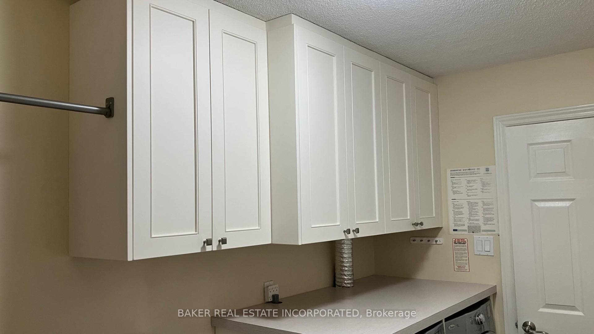 Unit 113 Laundry Room Cupboards