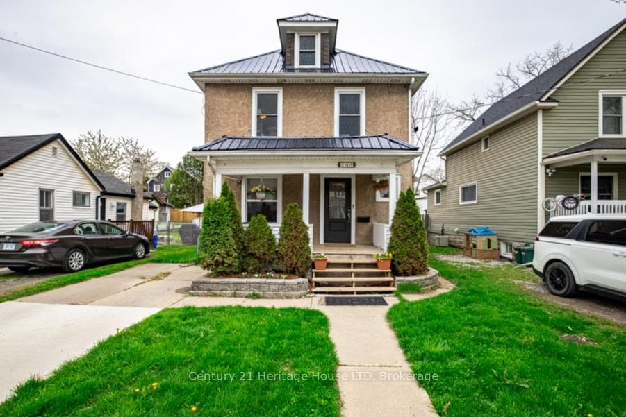 Front Elevation ~ Covered Porch, Metal Roof