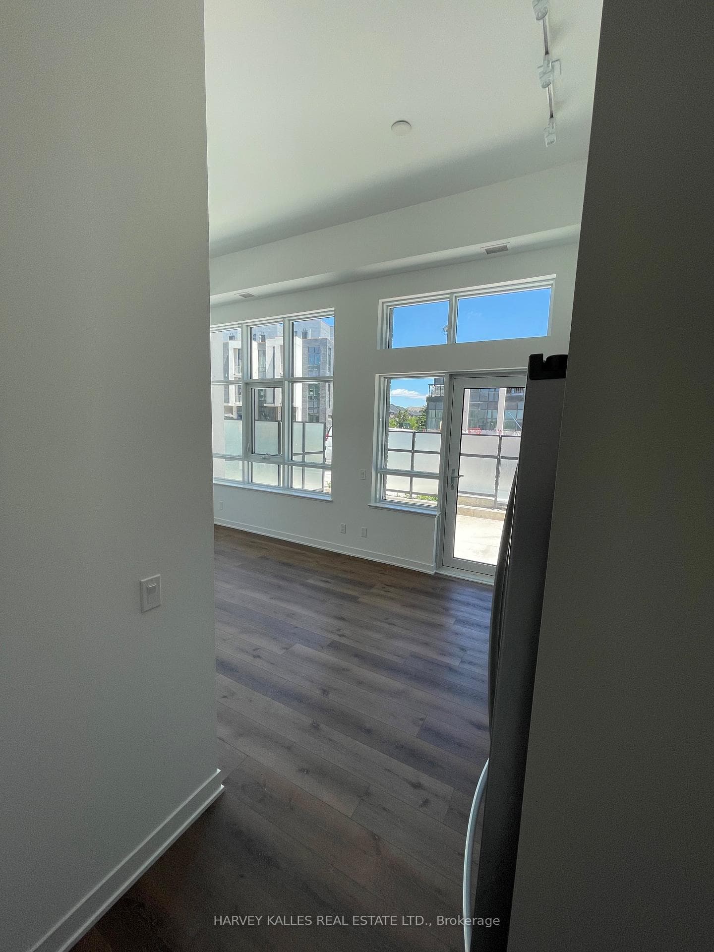entry to living room / kitchen / patio / primary