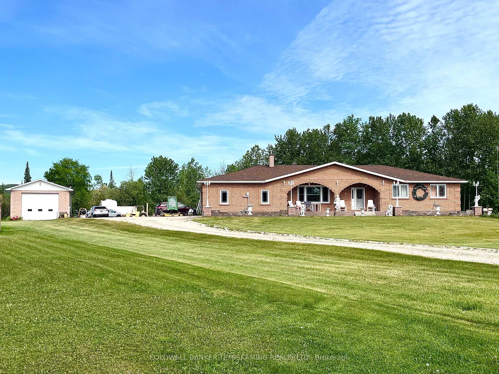 1.6 acre lot with oversized bungalow and shop