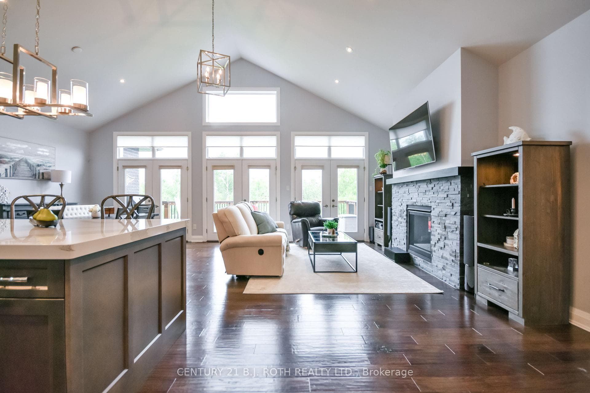 Vaulted ceiling, gas fireplace & stunning floors!