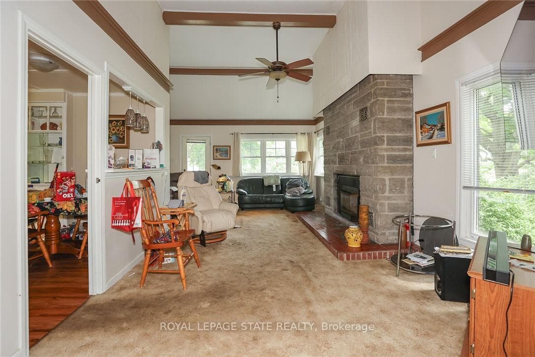Sunlit main floor with beautiful fireplace