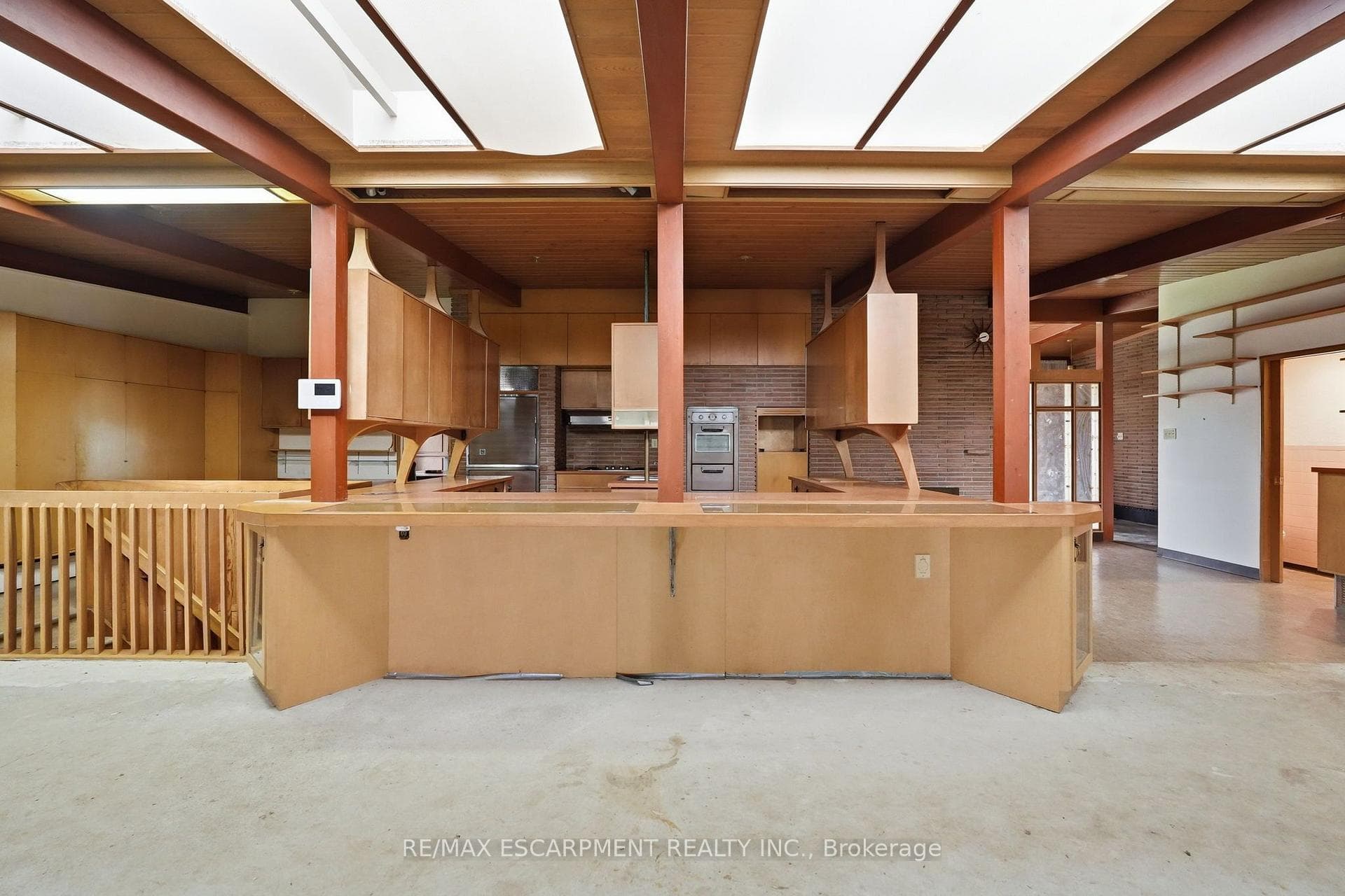 Expansive open-concept kitchen and living area