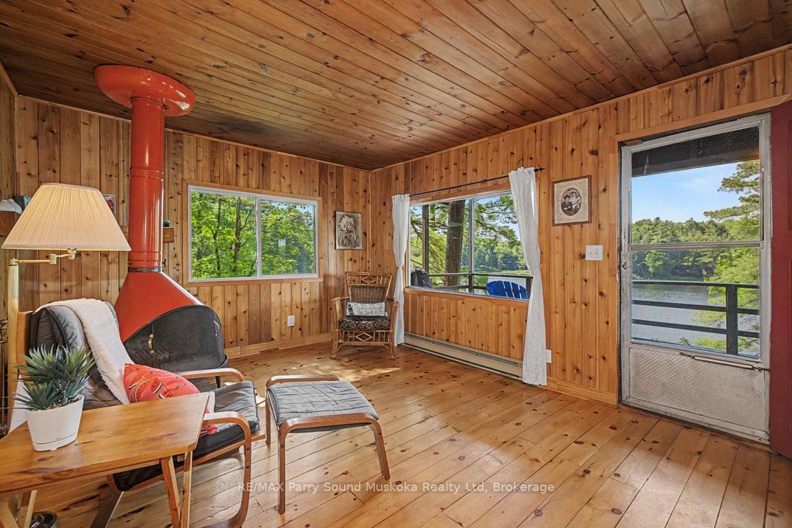 Bright living room wrapped in windows
