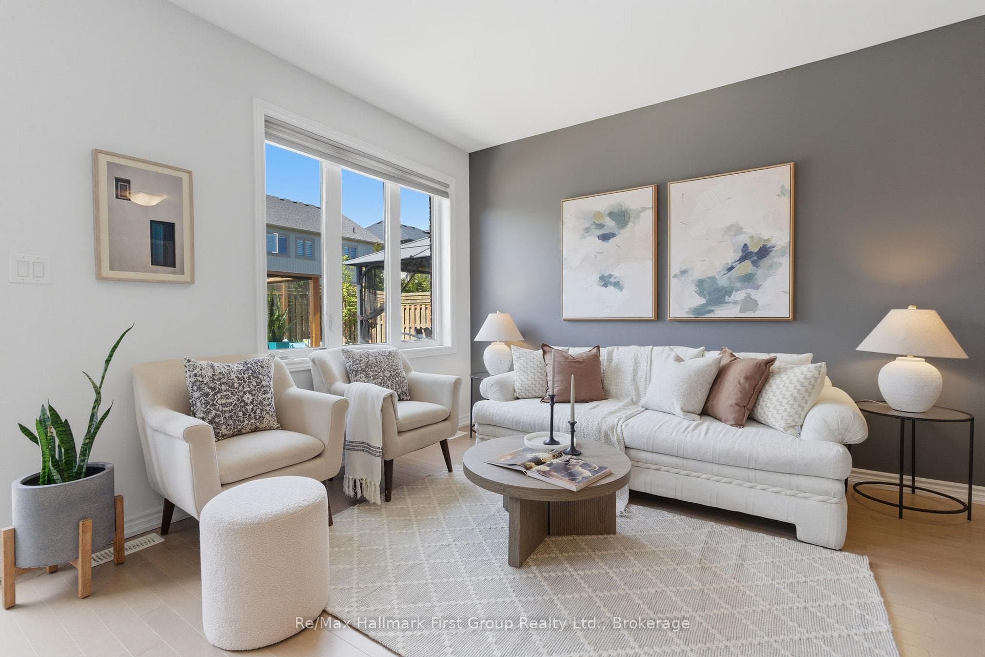Living Room seating area overlooking back yard