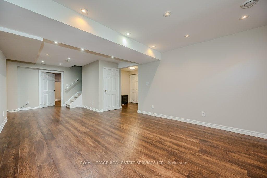 Recreation Room with Engineered Hardwood Flooring