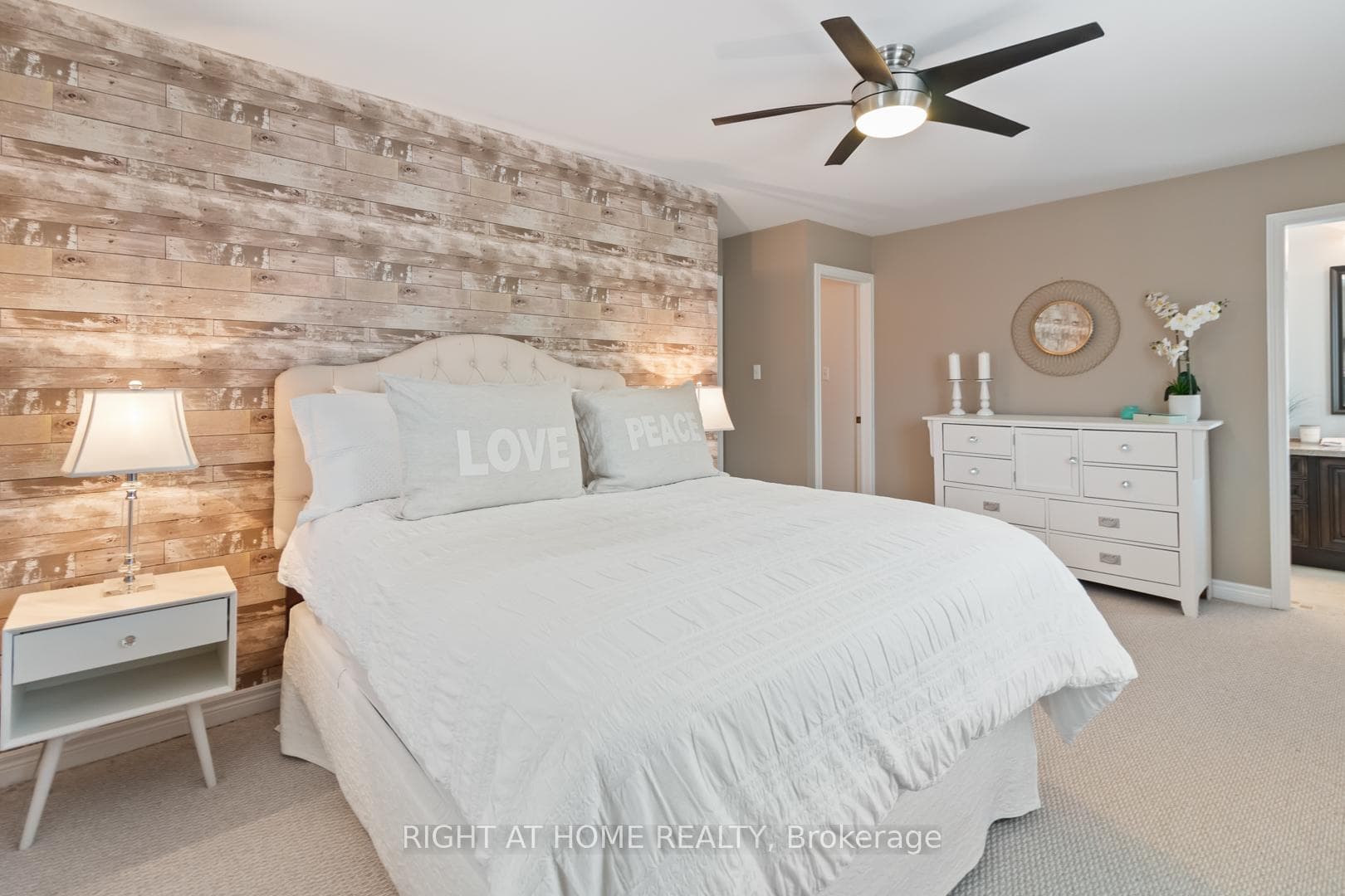 Primary bedroom with feature wall
