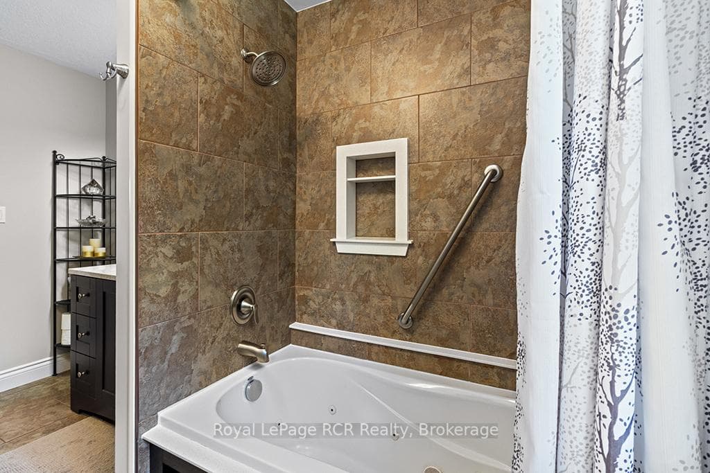 Includes shower and jet-soaker tub.
