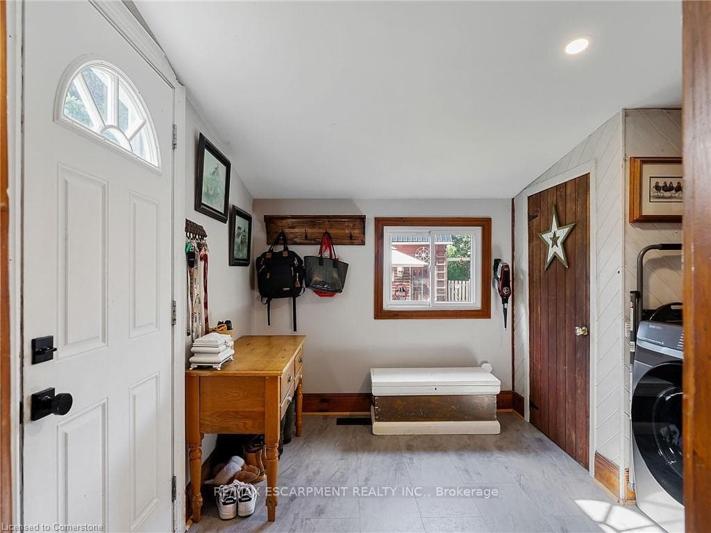 Side Entrance/ Laundry Room