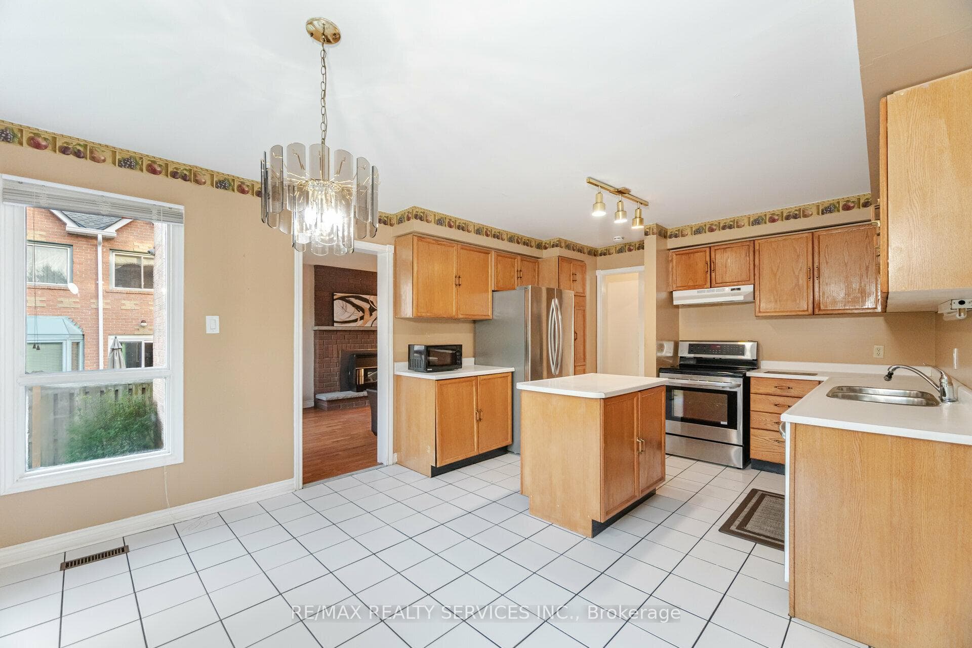 Eat-in kitchen overlooking the backyard
