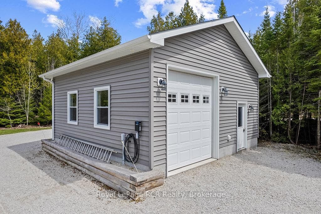 Oversized 24x24 heated garage with 10ft doors x2.