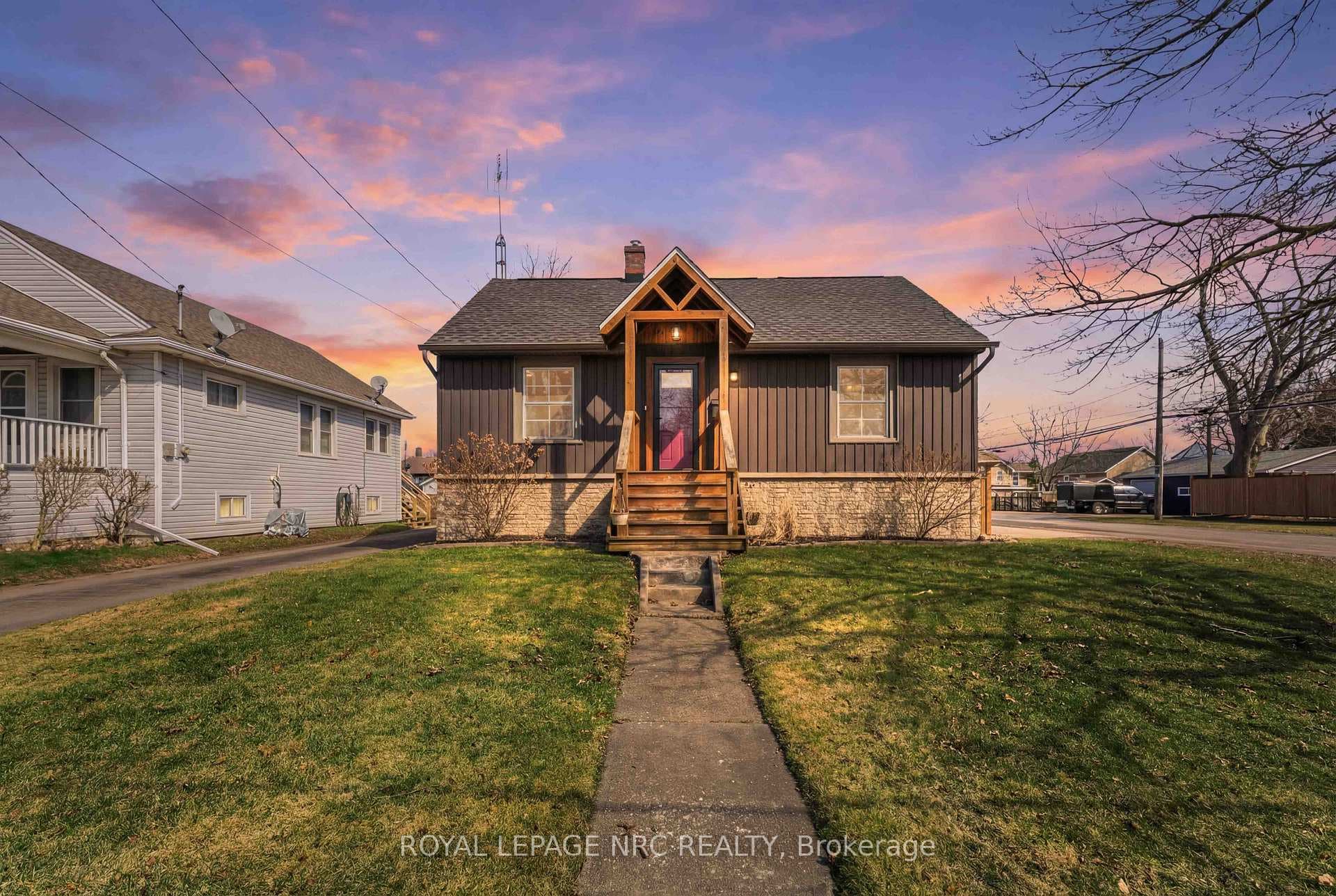 Perched on a corner lot facing west