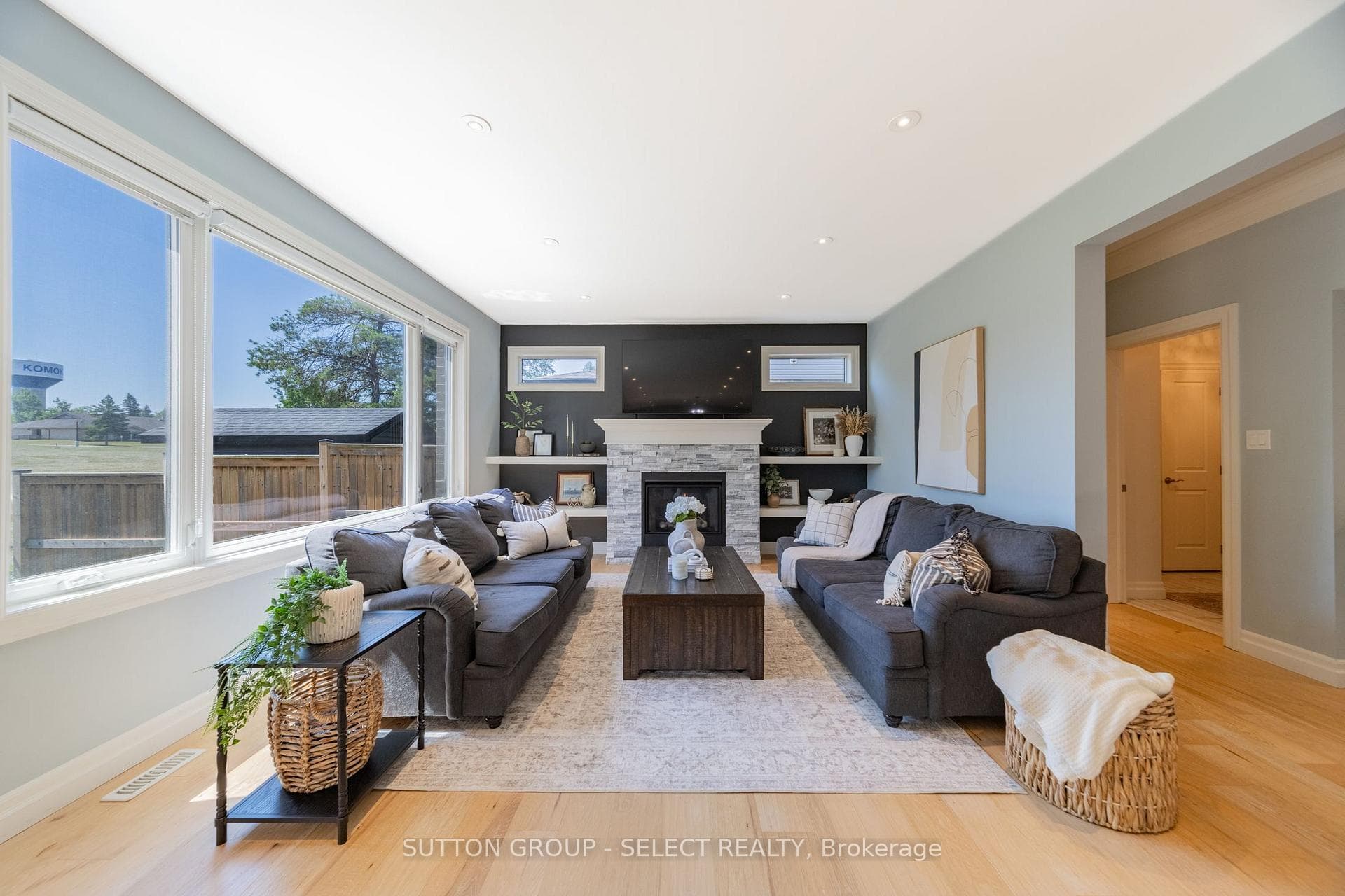 Living room with gas fireplace and built-ins