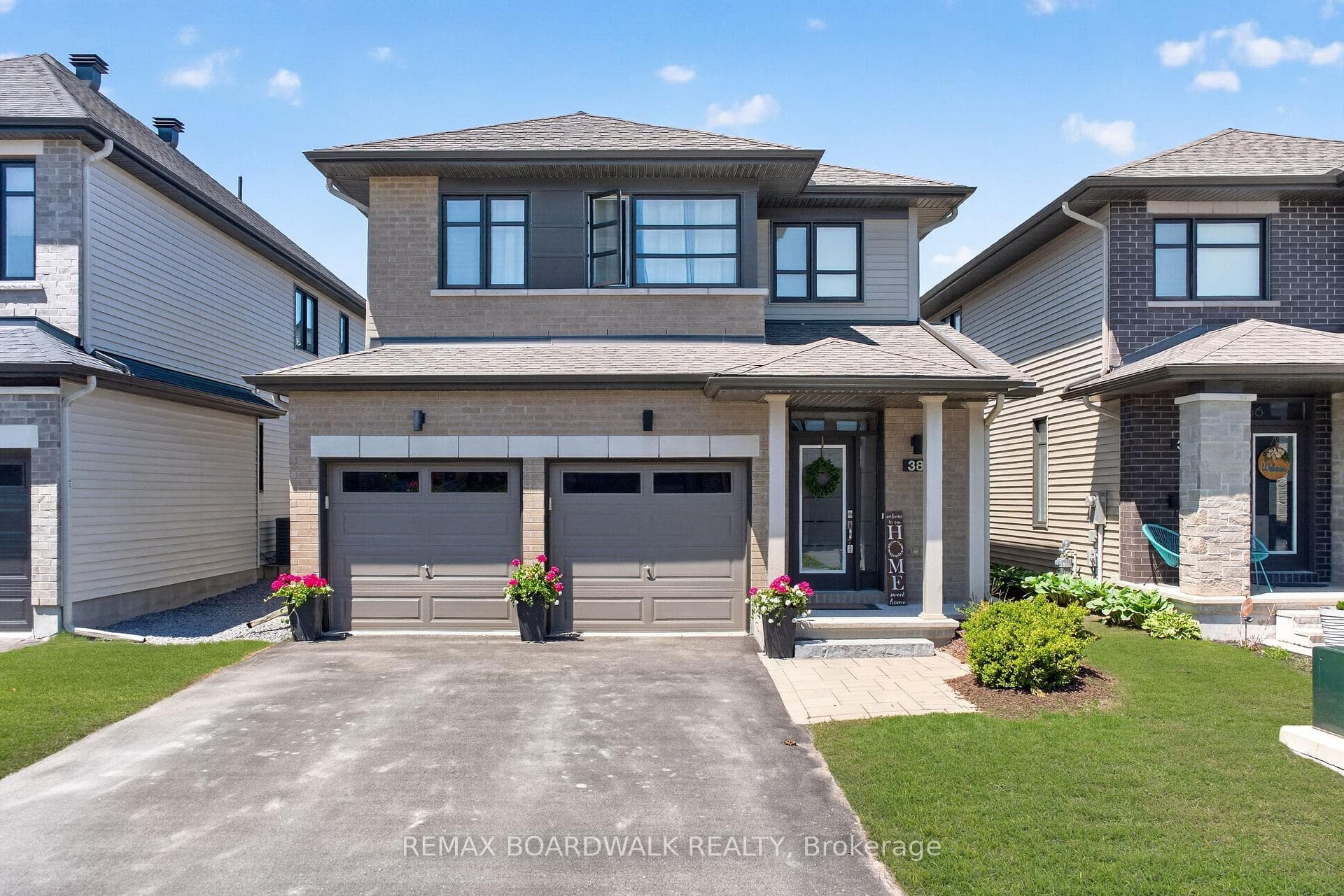 Tons of Upgrades & Prof Landscaped Front & Back!