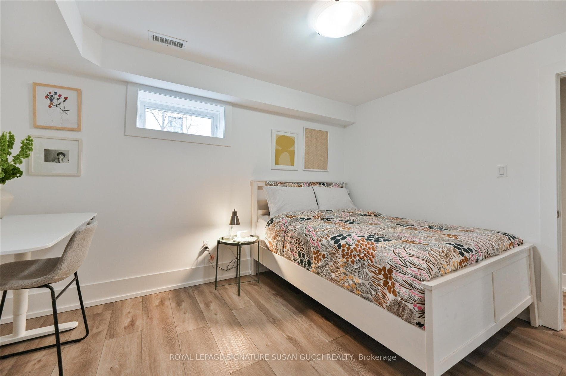 Bright lower level bedroom is spacious