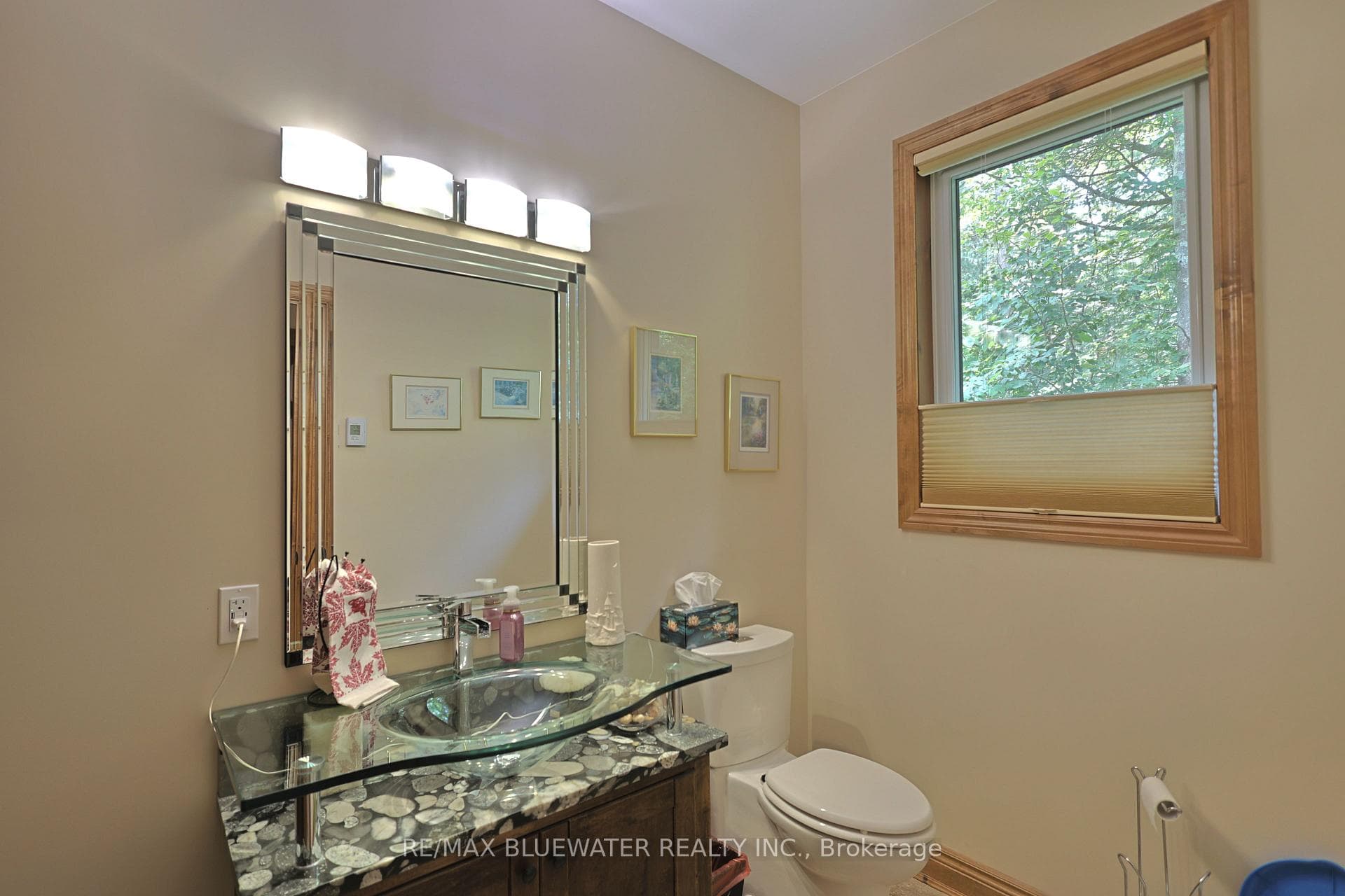 Powder Room with Granite Vanity & Glass Sink