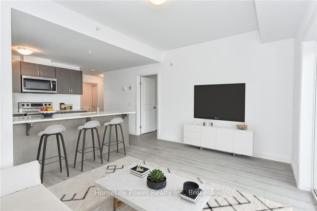 Open-concept living/kitchen (Virtually Staged)