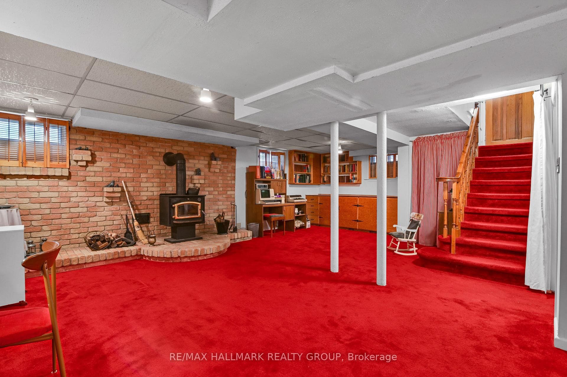 Basement - Media Room - wood burning fireplace