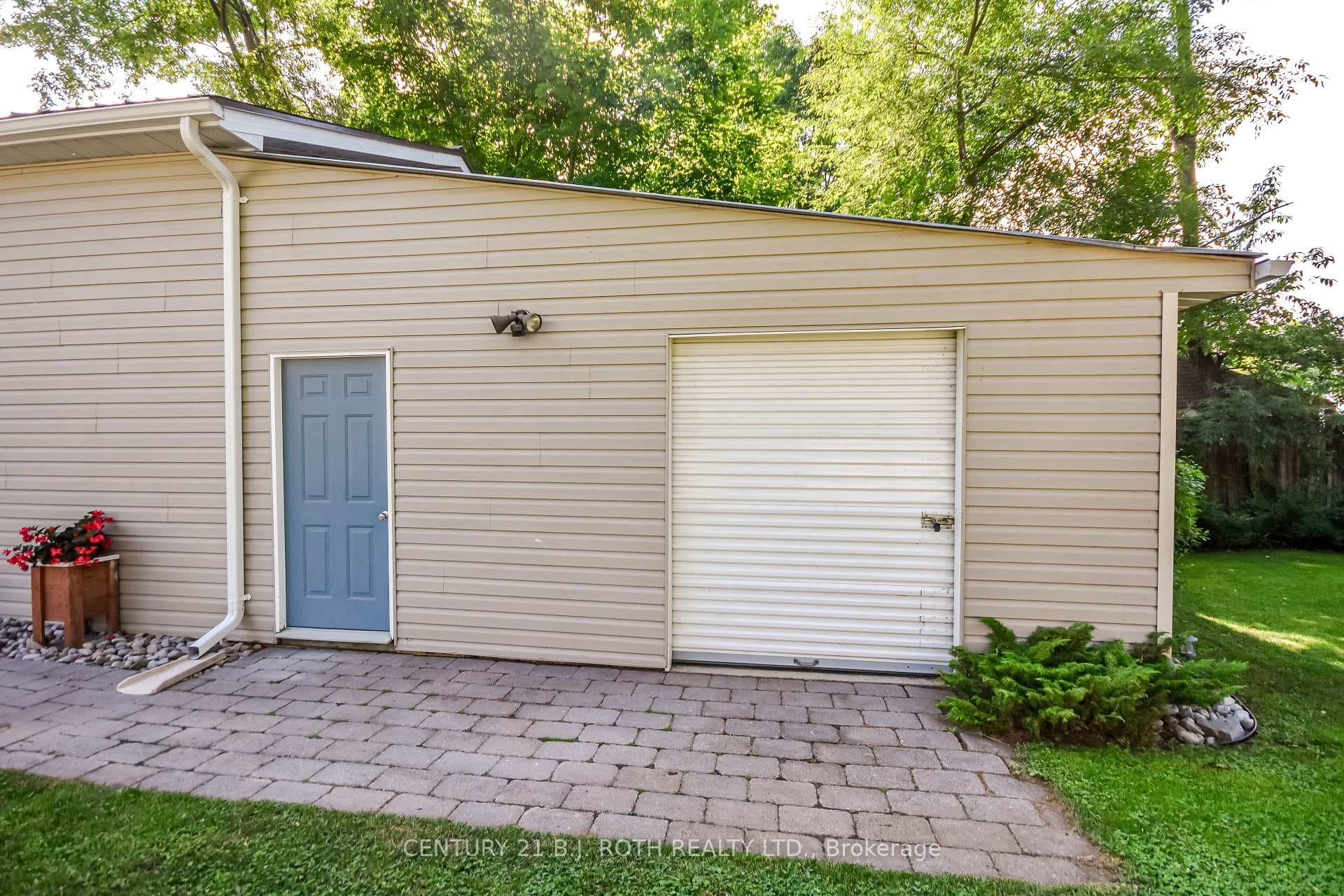 Attached workshop and storage garage