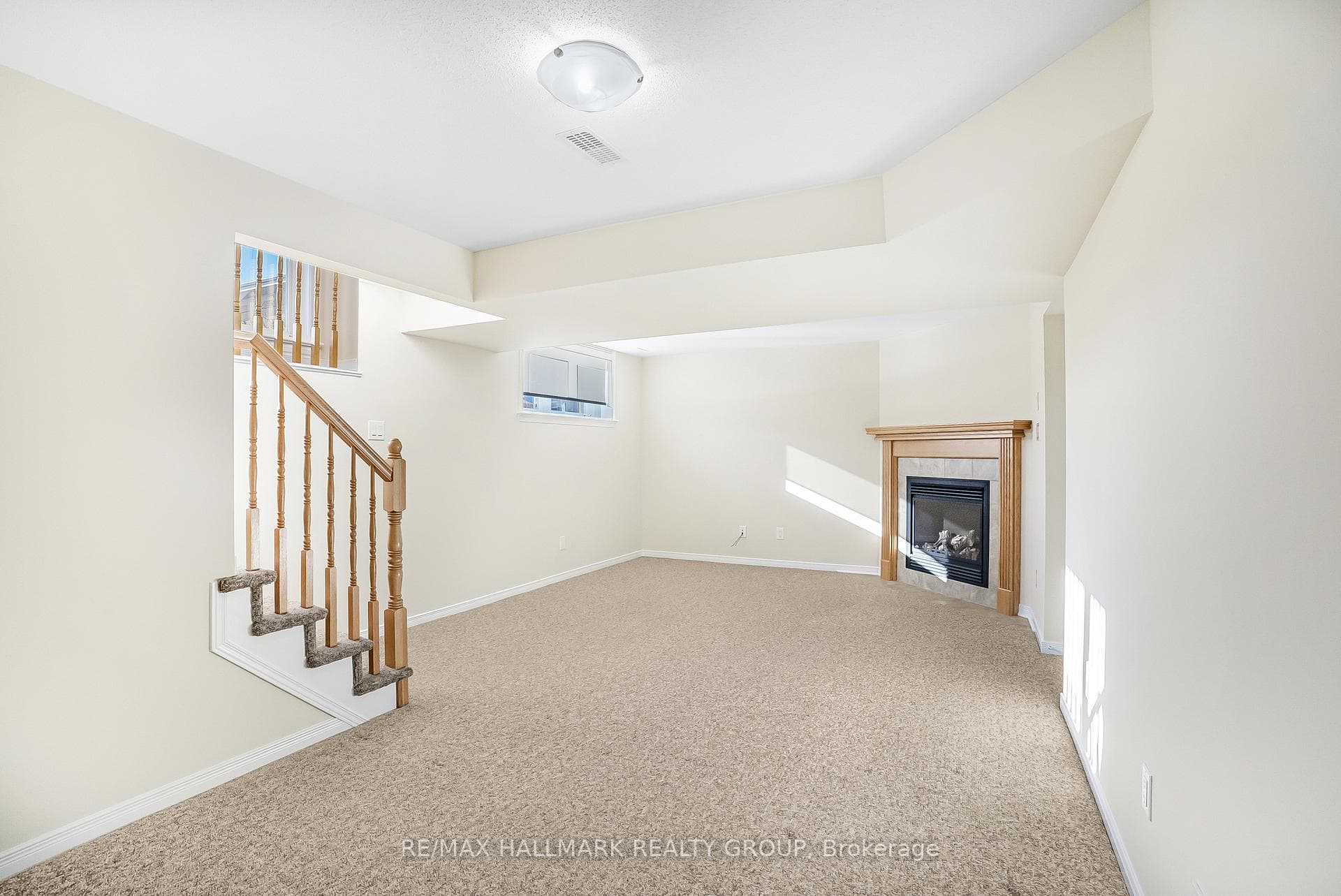 A GAS FIREPLACE & BERBER CARPET make this so cosy!