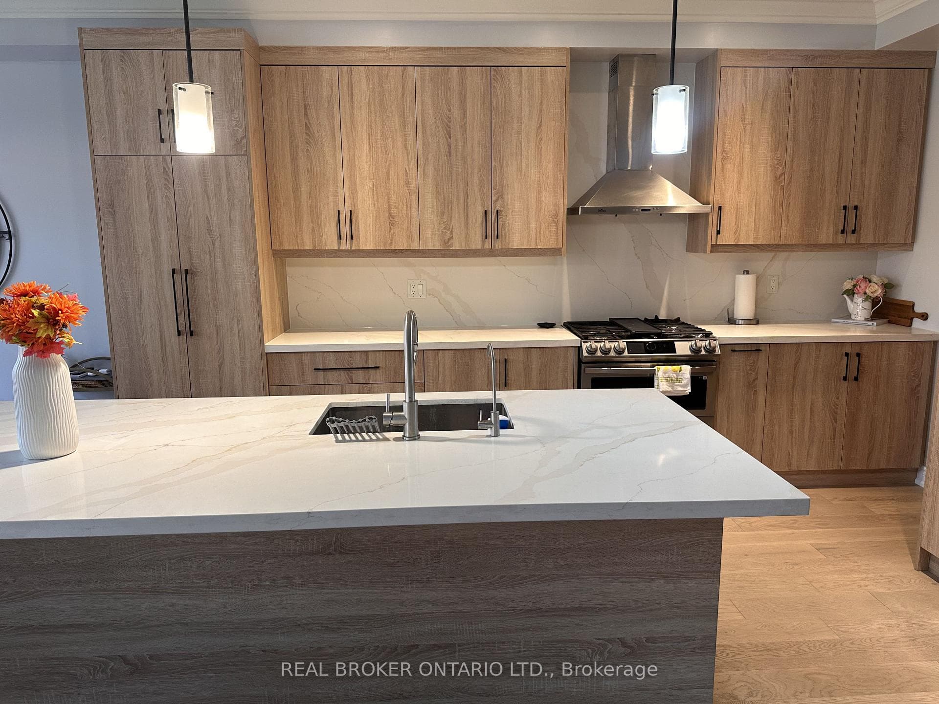 quartz countertop, gas stove