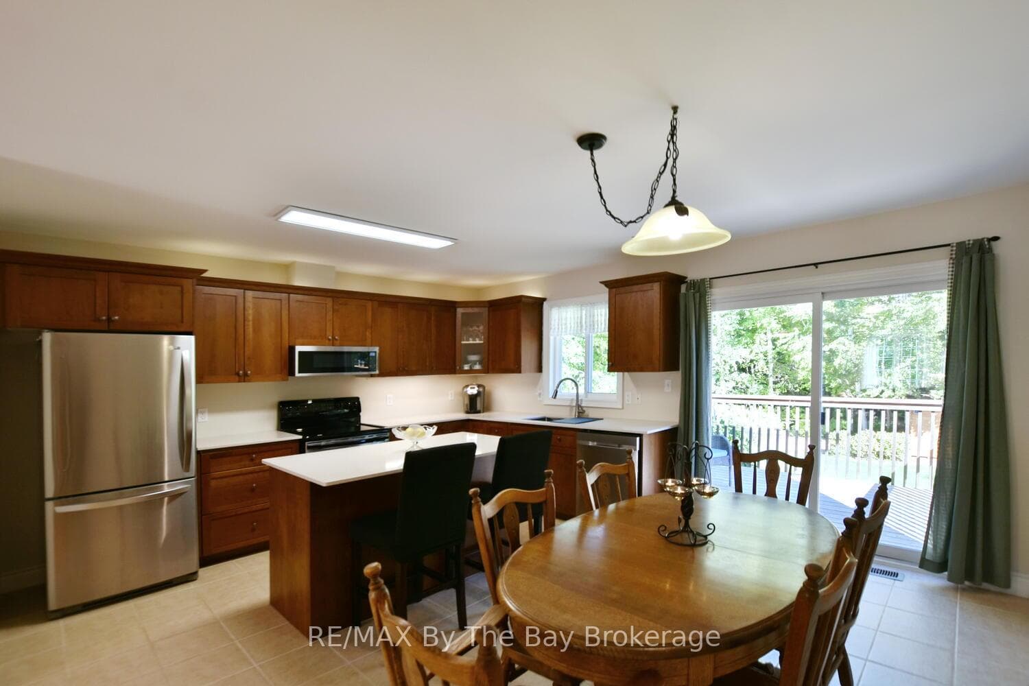 Dining Area with Patio Doors to Deck Area