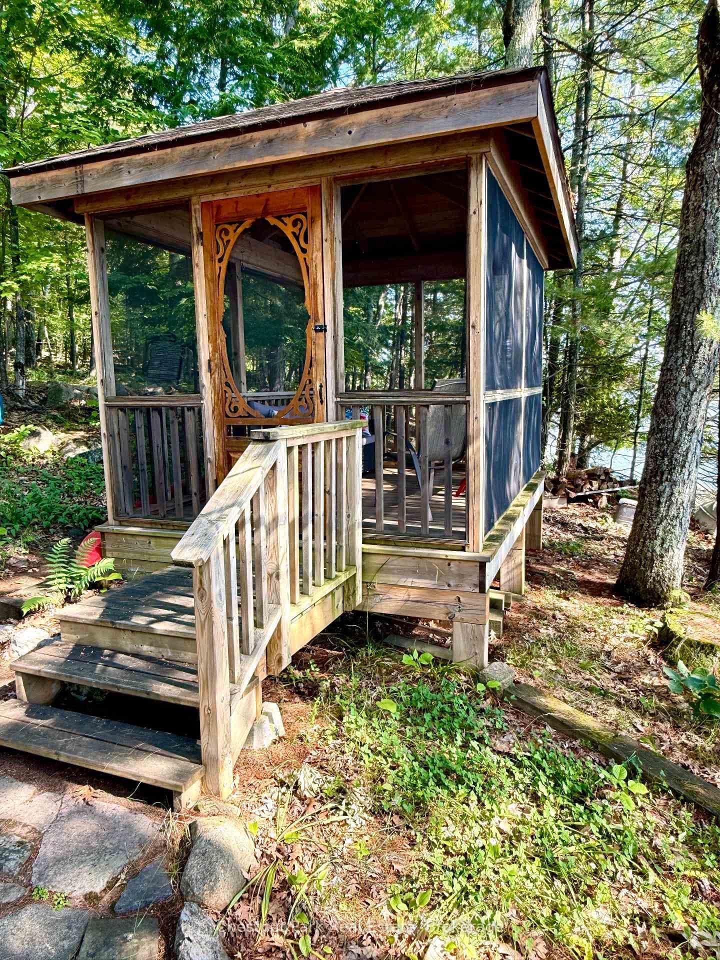 9x12 screened gazebo overlooks lake