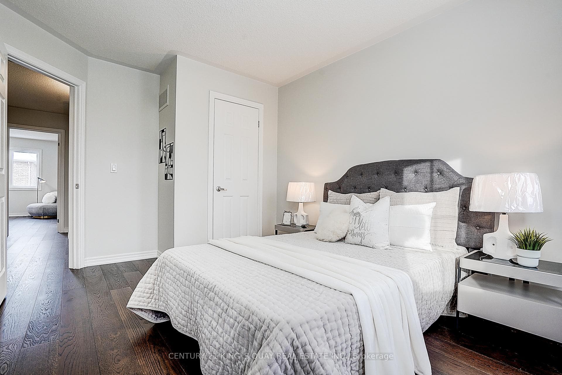 2nd BR with wood flooring, big windows & closet