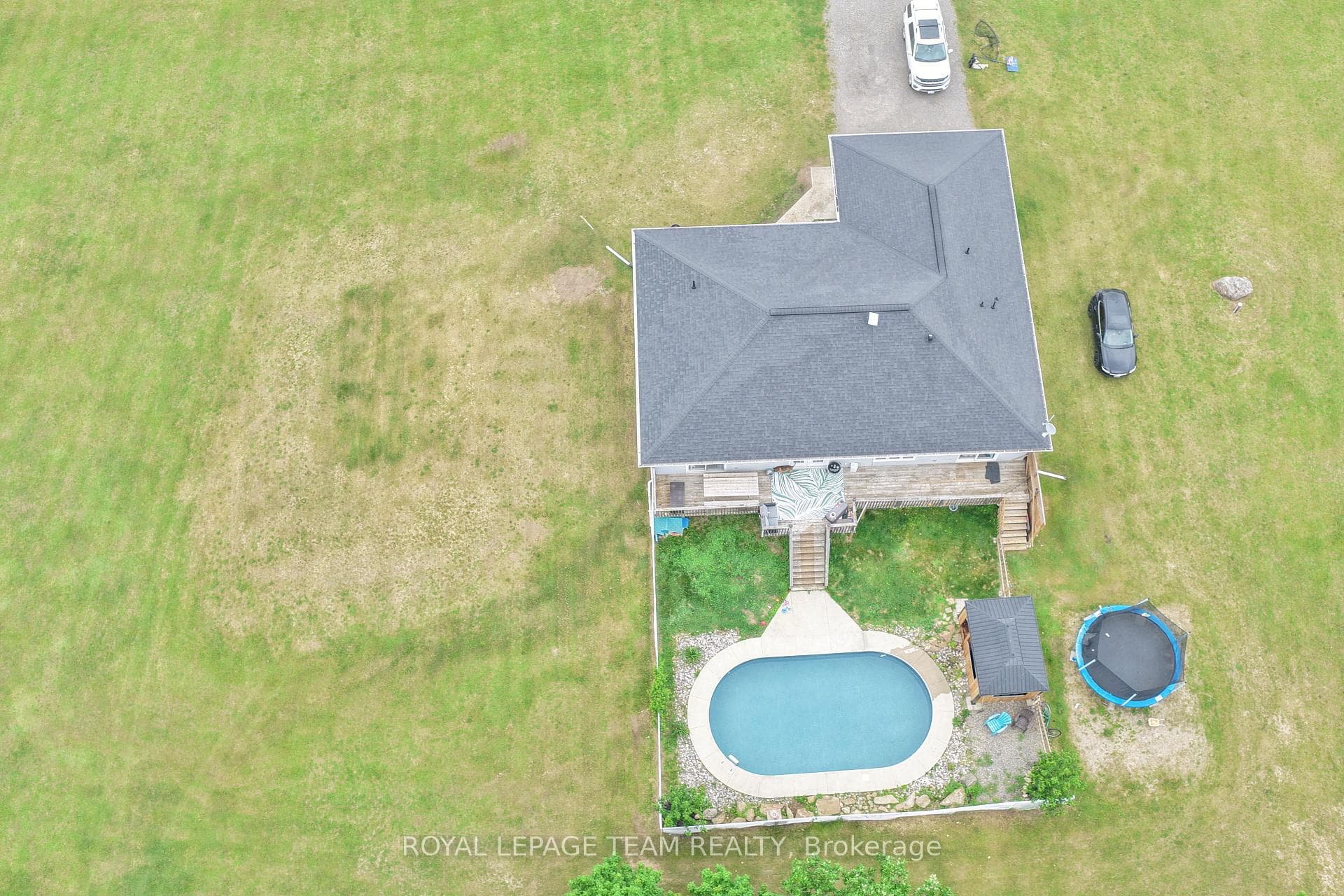 covered hot tub to right of pool!