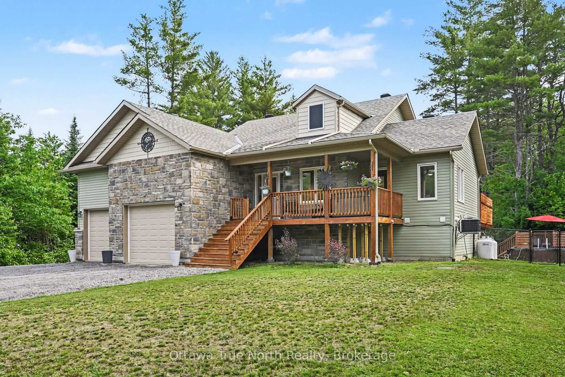 1196 Flat Rapids Road photo 1