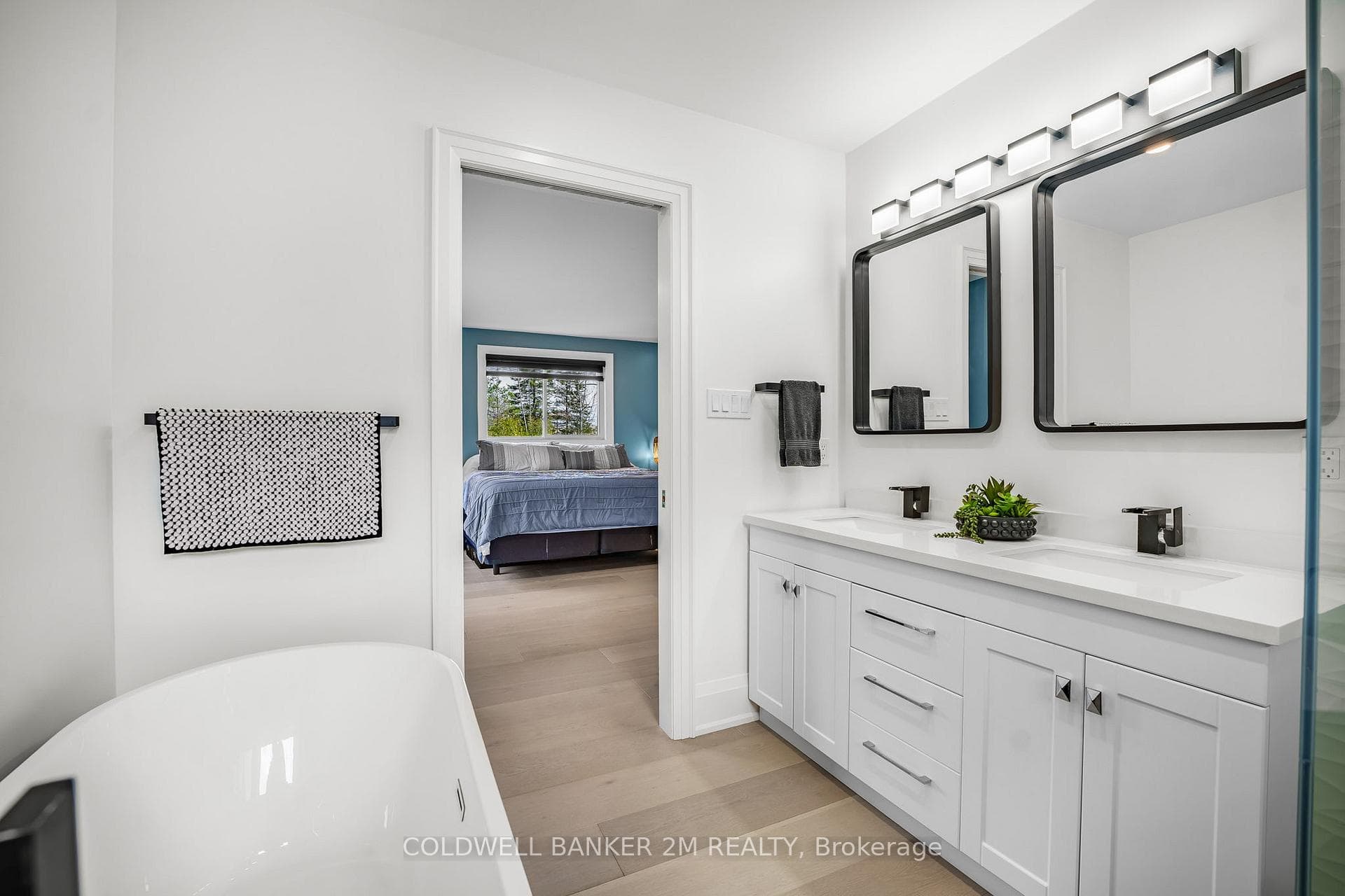 Double Sinks & Soaker Tub in Primary Bedroom Bath.