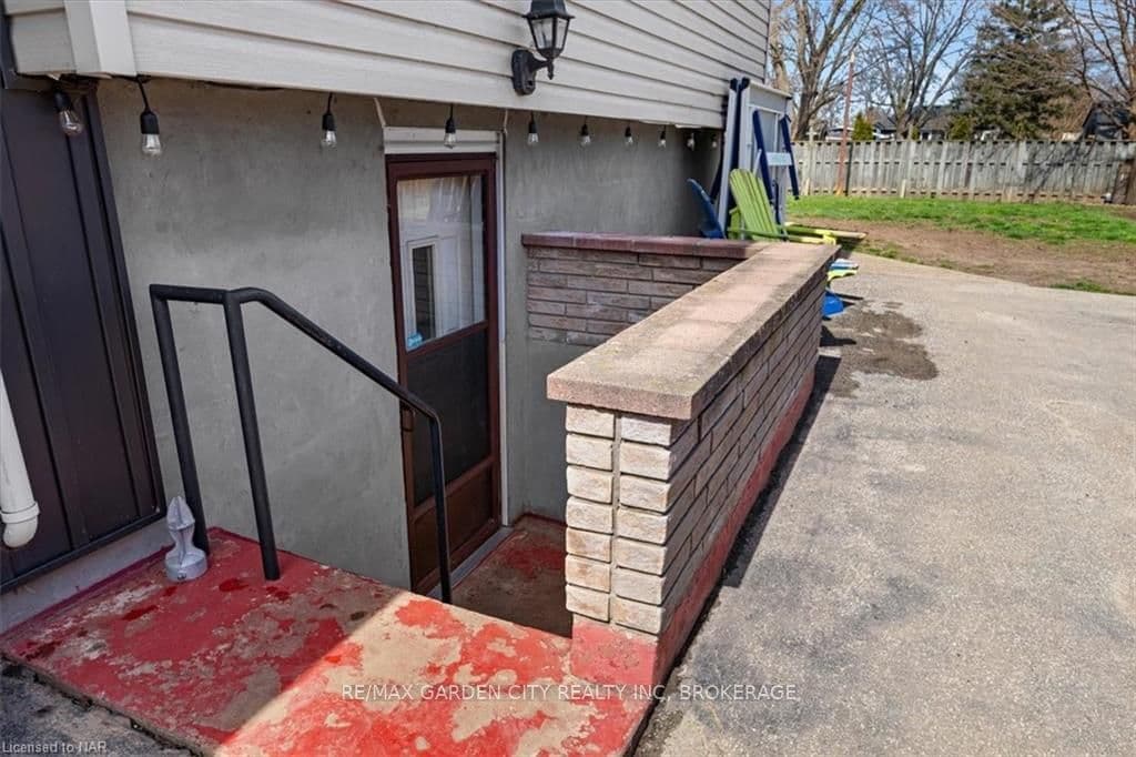 basement walkup to fenced patio area