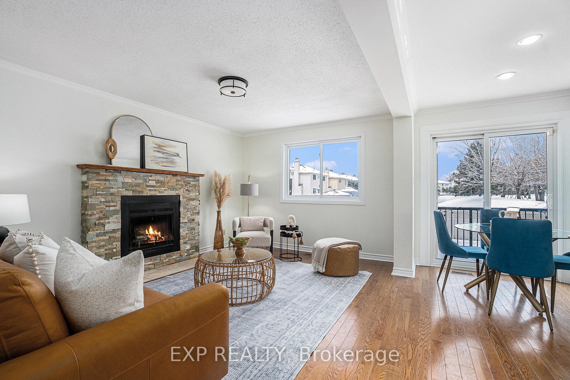 Main Floor Family Room w/wood burning fireplace.