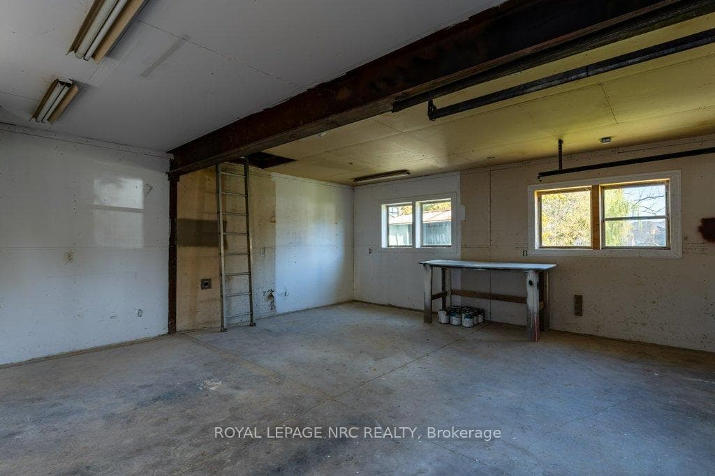 Garage, interior, ladder to attic storage