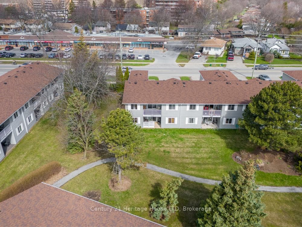 End Unit w/Balcony overlooking Park-like setting.