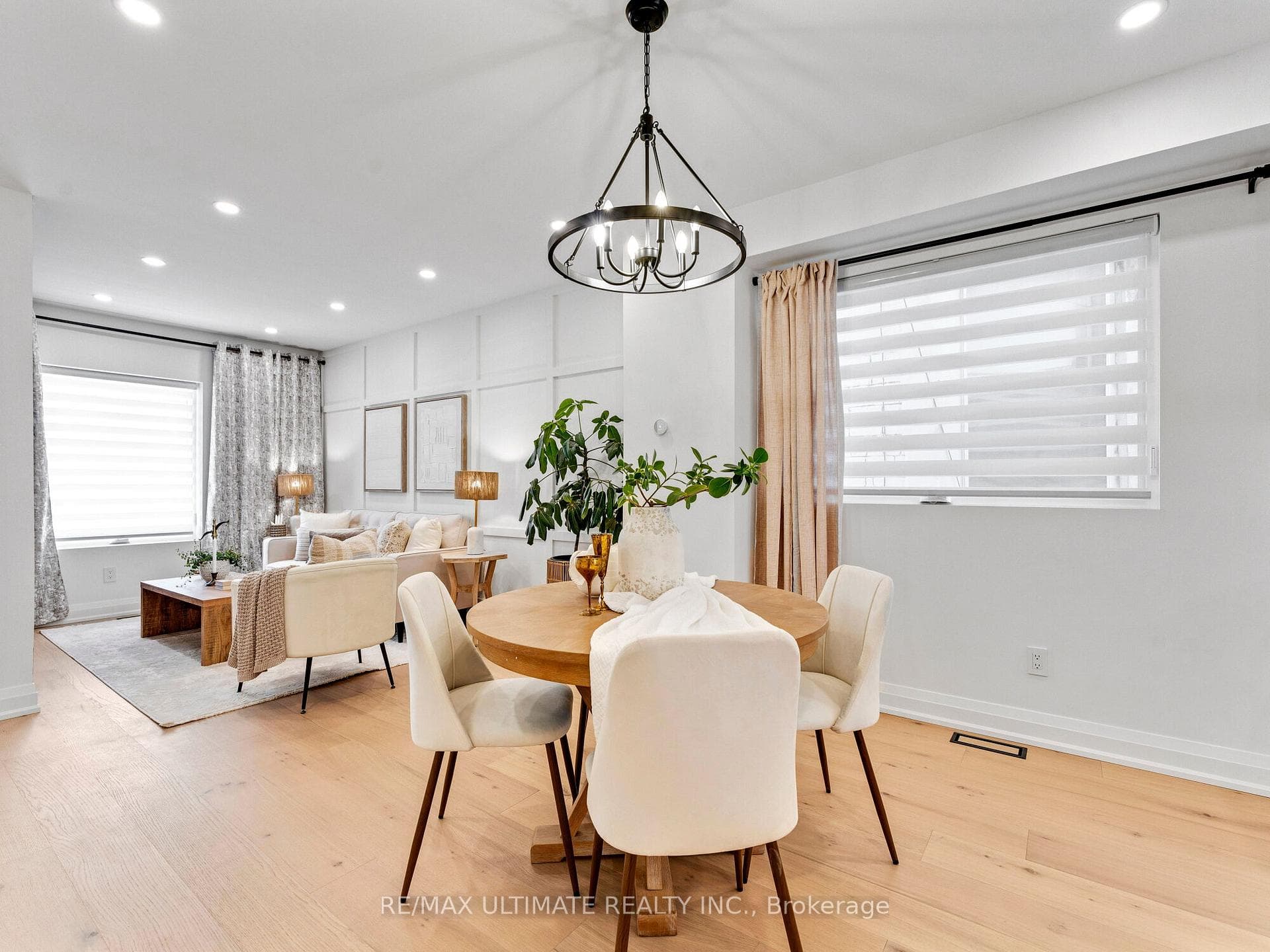 Dining overlooks kitchen and living room