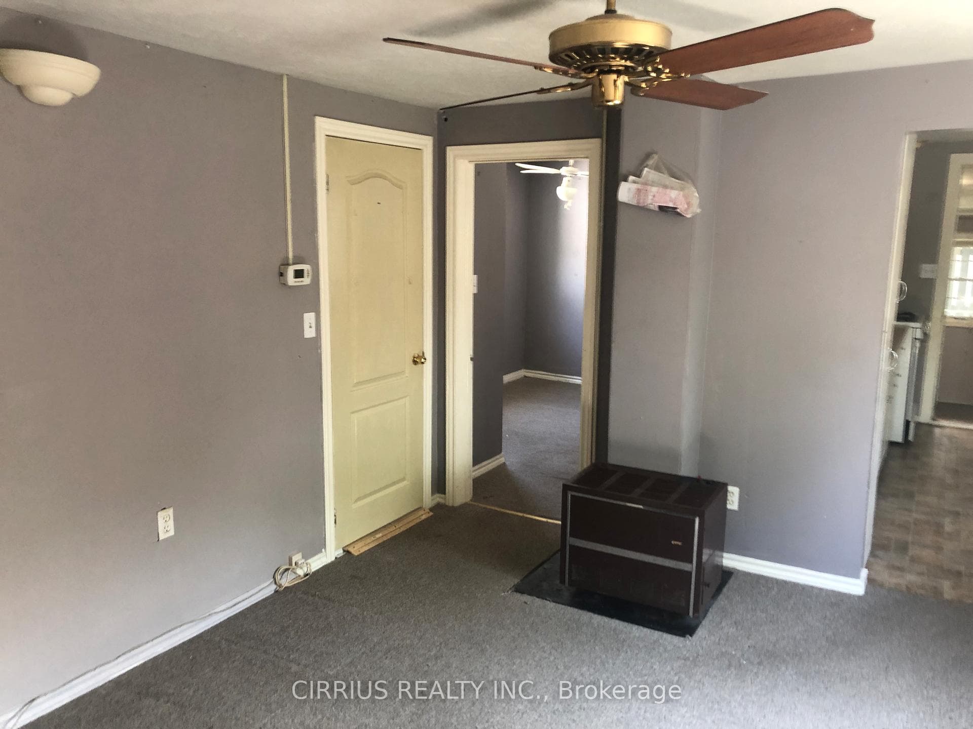 Living room with gas space heater.