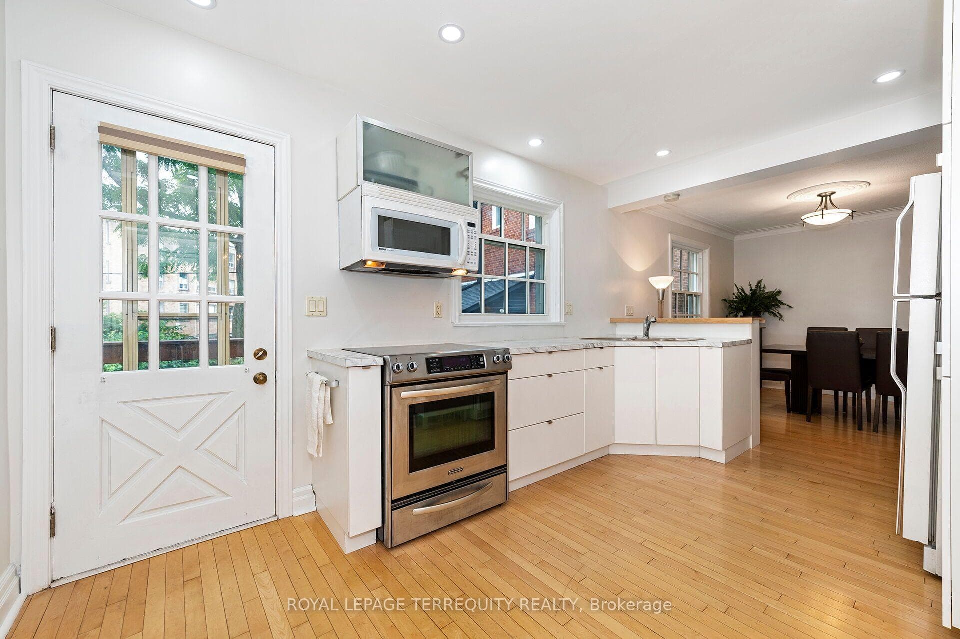 Kitchen has Walk out to Backyard