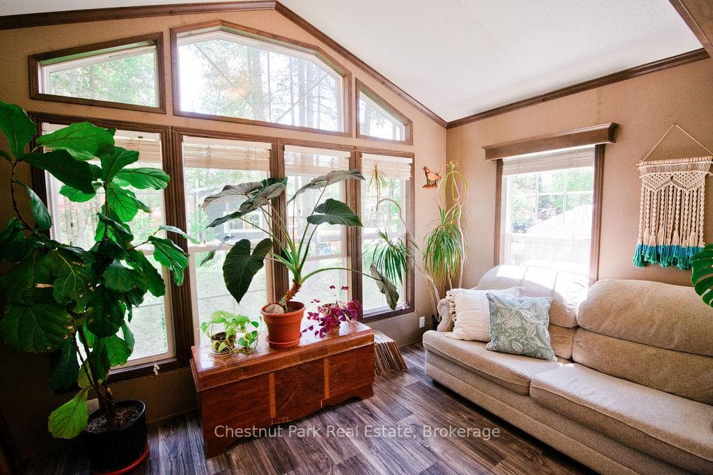 Bifold Door separates Den and Living Room