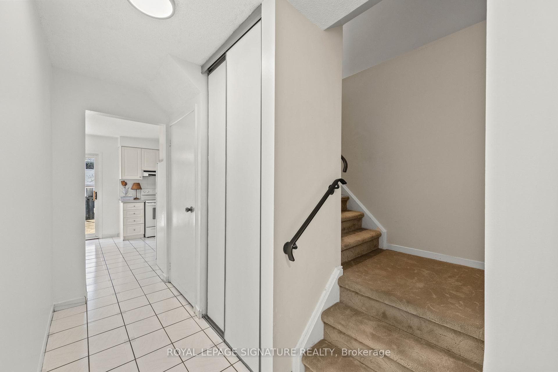 Hallway and stairs to second level