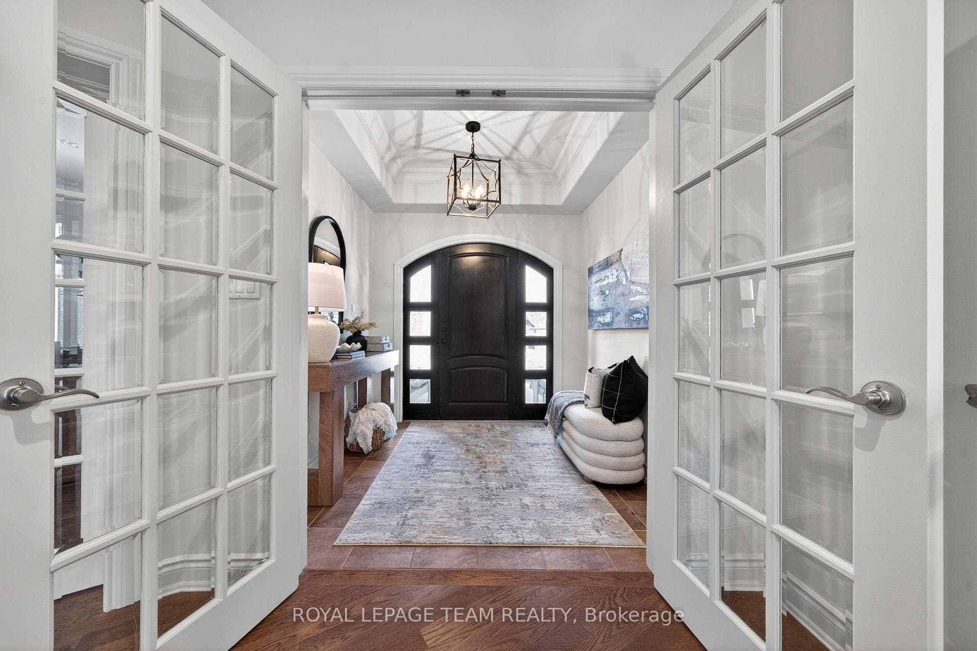 Grand entrance opens to sun filled great room