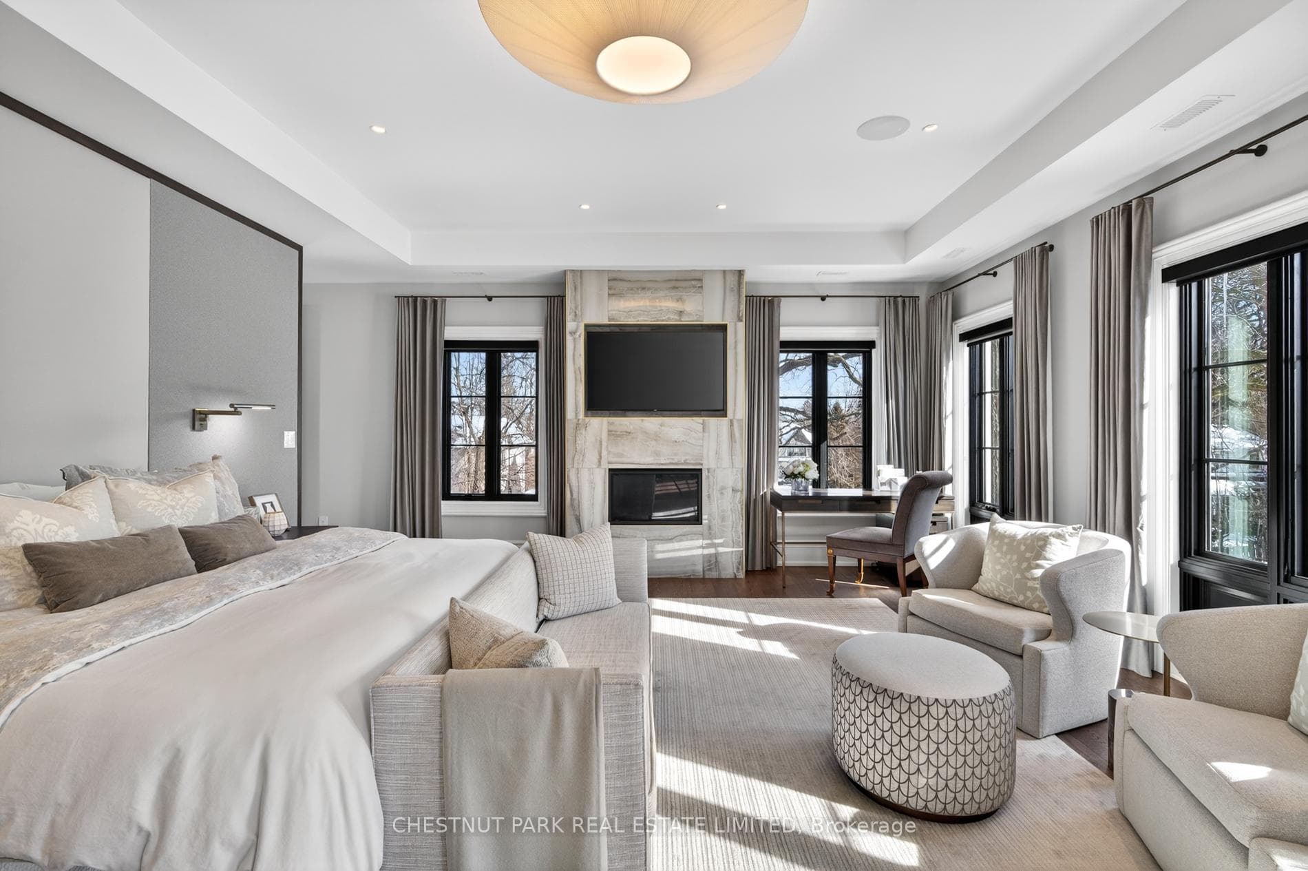 Primary Suite with Sitting Are and Fireplace