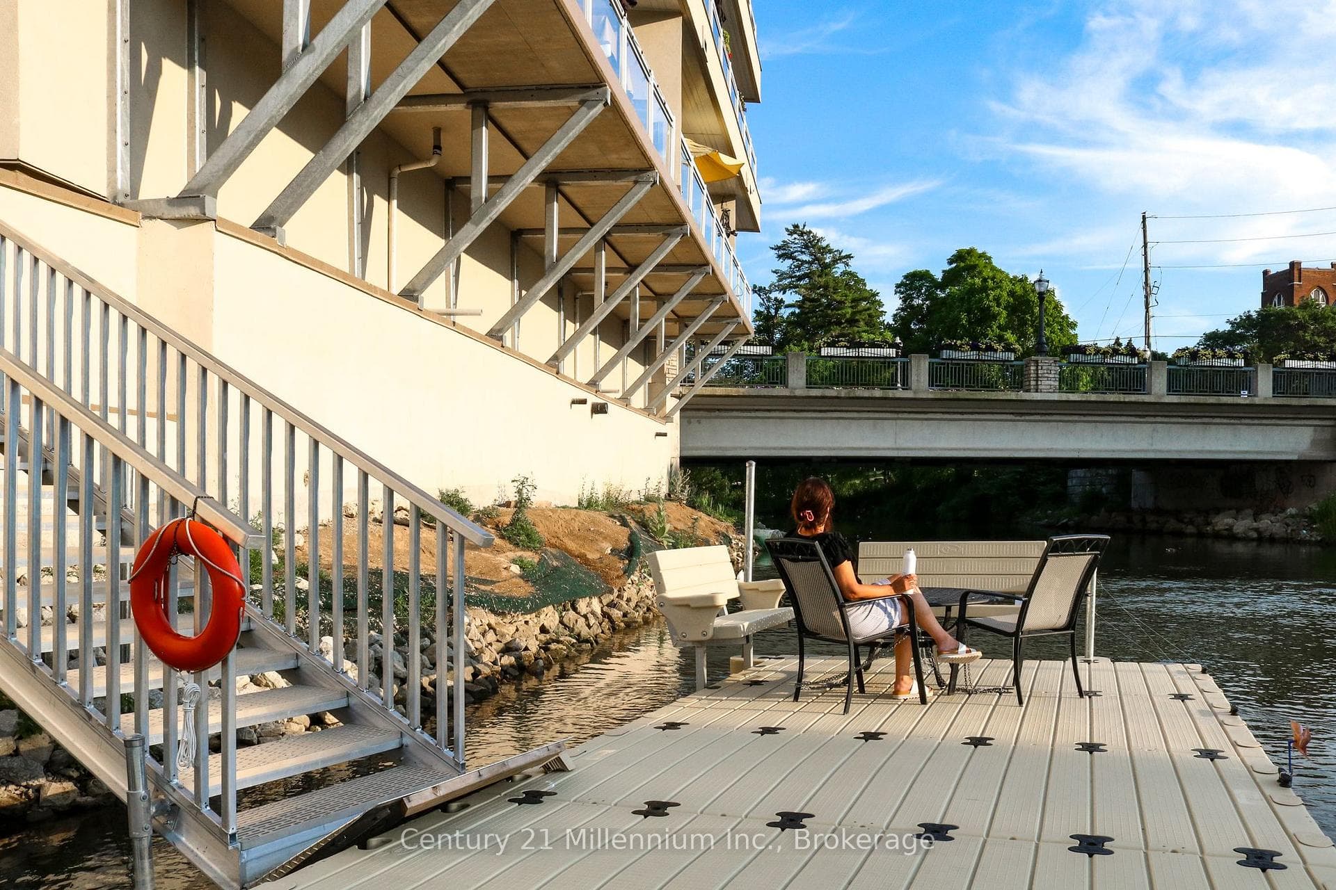 Floating deck with benches, table and chairs
