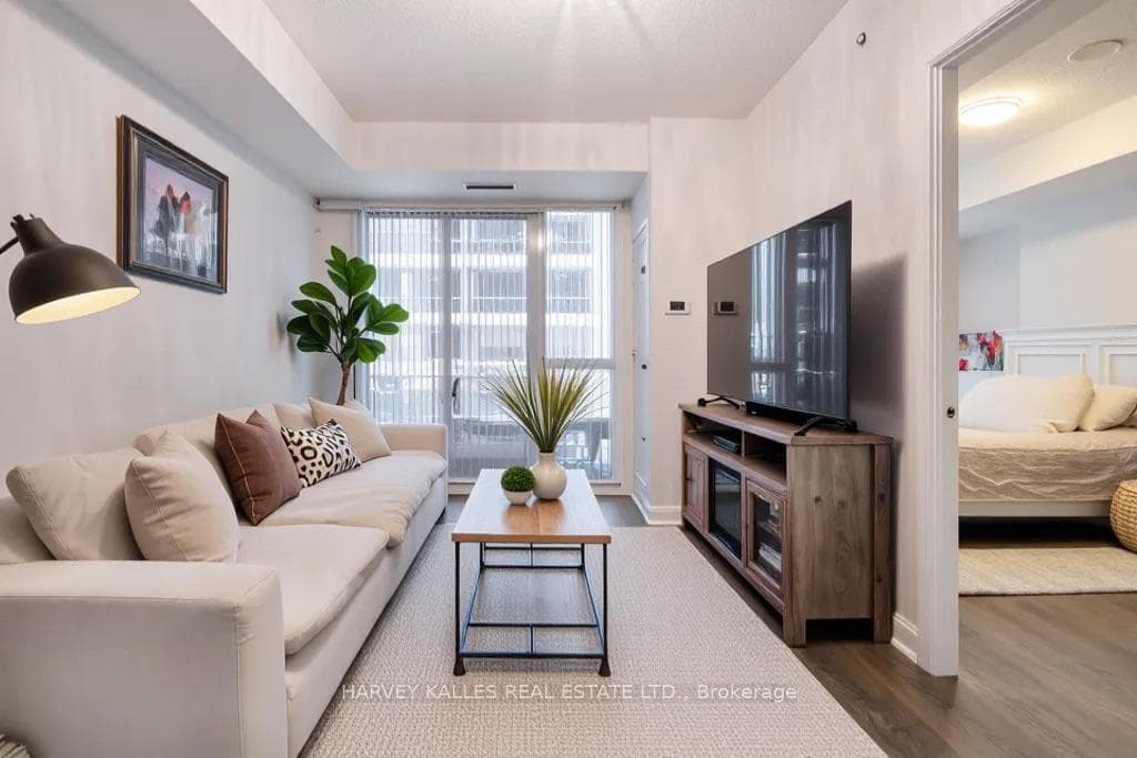 Living room walks out to balcony
