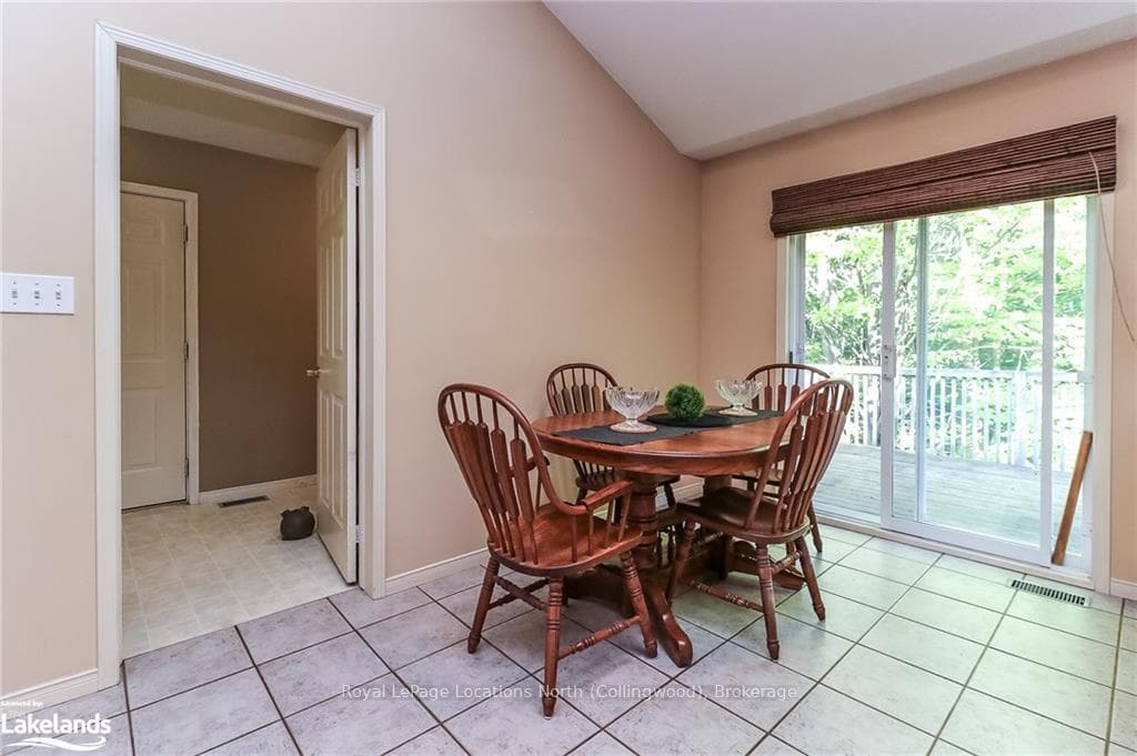 Patio doors to large private deck!