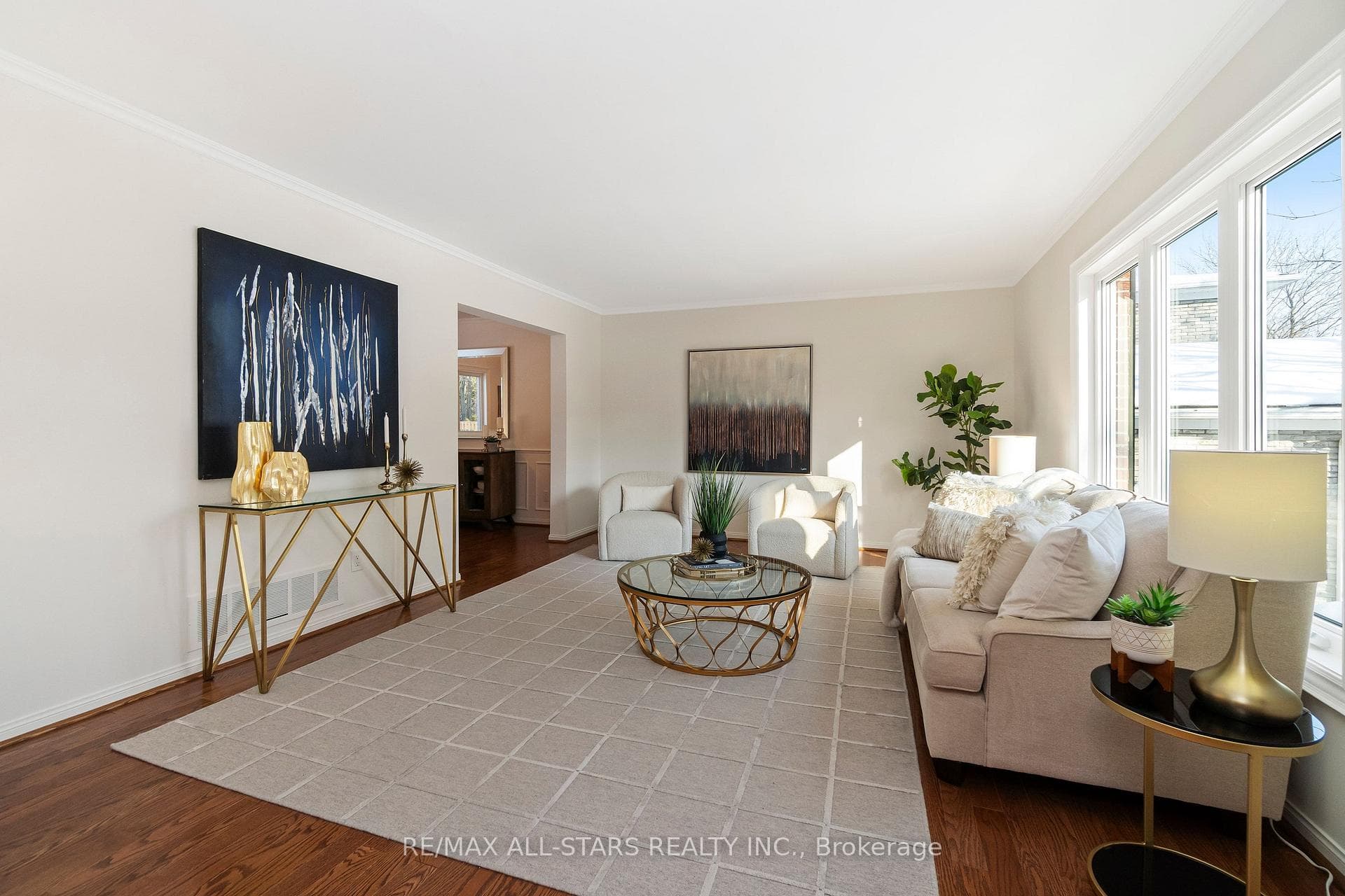 Sunny south living room w hardwood flrs