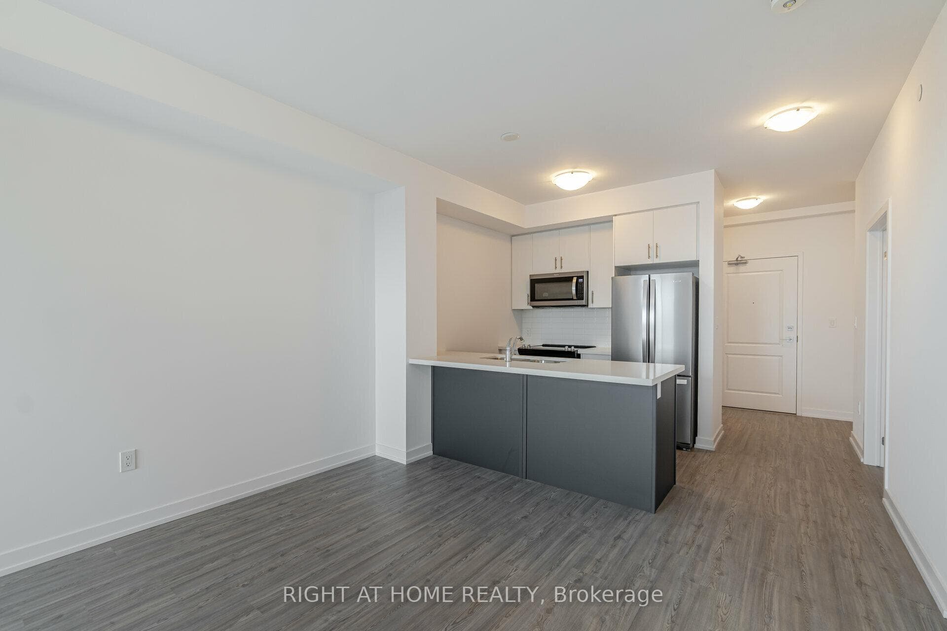 Upgraded Water-Resistant Vinyl Flooring Throughout