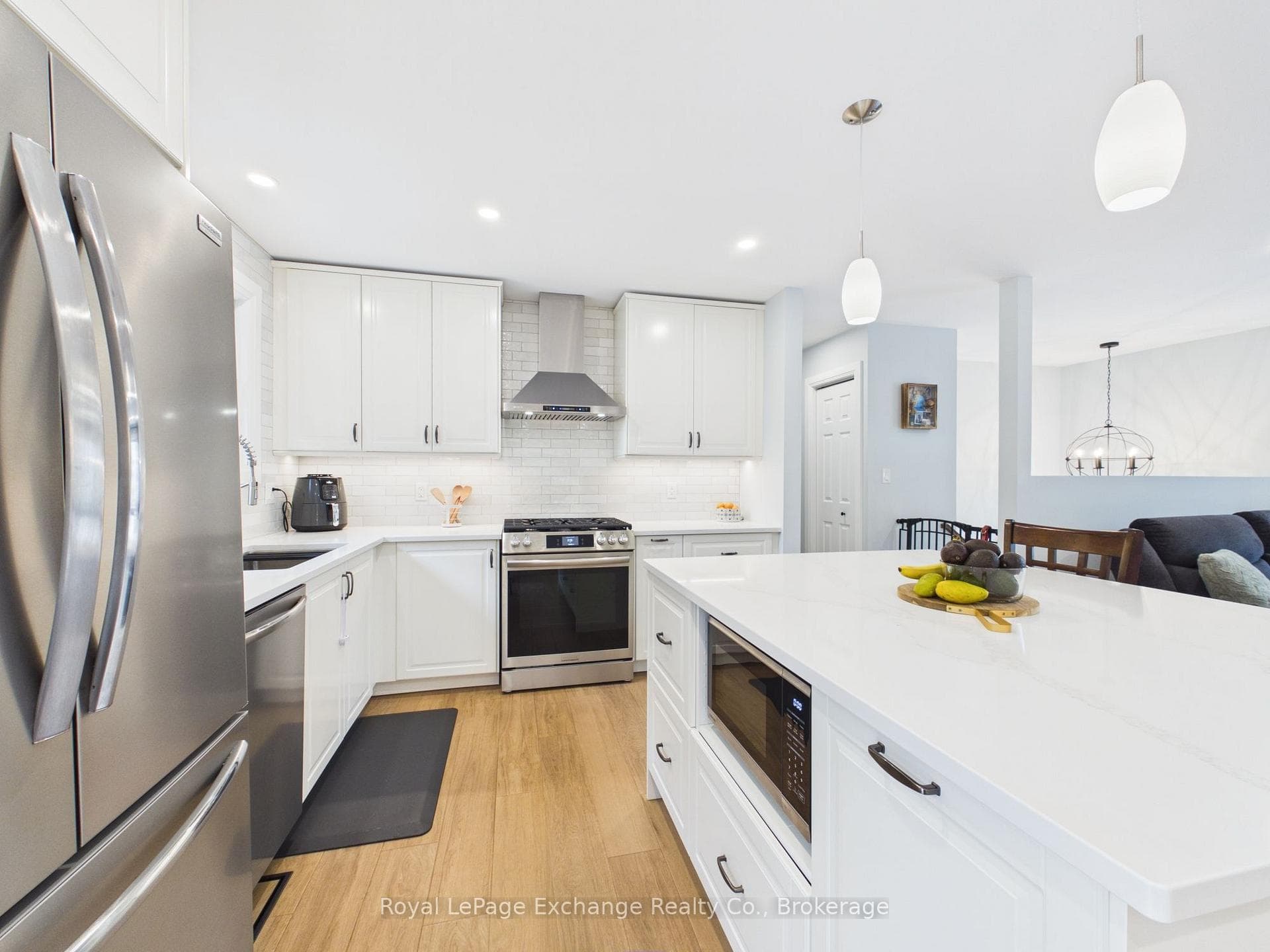 Quartz countertops, counter to ceiling backsplash